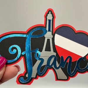 France scrapbooking album photo embellissement décoration titre papier piercing fait main tour Eiffel