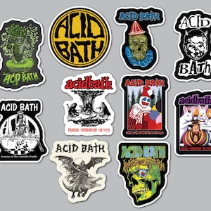 May include: A collection of ten vinyl stickers featuring various Acid Bath band graphics, including skulls, clowns, rabbits, and dark illustrations. Each sticker displays the band name Acid Bath in distinct fonts and colors, with white borders.