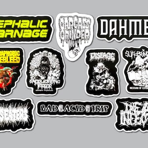 May include: A collection of ten die-cut vinyl stickers featuring various band logos and graphic illustrations in black, white, and neon yellow. The designs include text such as Cephalic Carnage, Carcass Grinder, Dahmer, Agoraphobic Nosebleed, Excruciating Terror, Disease, Suffering Mind, Fetus Eaters, Bad Acid Trip, and Dead Infection.