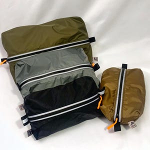 Auszugstaschen/Getriebetaschen für Camping, Angeln, Jagen, Backpacking und andere Outdoor-Aktivitäten. Gefertigt aus Ripstop.