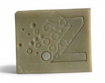 Jabón de leche de cabra Patchouli Alchemy: barra artesanal hidratante con aroma terroso y aroma a tierra.