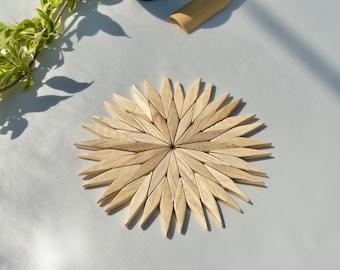 Ronde houten onderzetter voor warme gerechten, beukenhouten hittebestendige onderzetter in Starburst-ontwerp