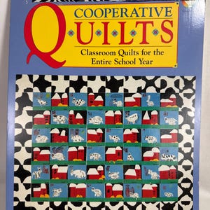 May include: A book titled "Cooperative Quilts" with a blue cover and a yellow banner. The banner reads "COOPERATIVE QUILTS" and "Classroom Quilts for the Entire School Year." The cover features a quilt design with farm animals.