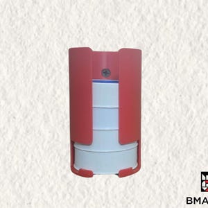 May include: A red plastic storage container with four white circular compartments. The container has a screw on the top and is designed to hold small items.