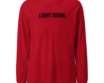 May include: Red long-sleeved t-shirt with the text "LIGHT WORK." printed in black.