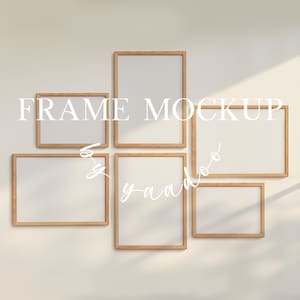 May include: A set of five wood framed picture mockups with white mats. The frames are arranged in a staggered pattern on a light beige wall. The text "FRAME MOCKUP by yaadoo" is visible in the center of the image.