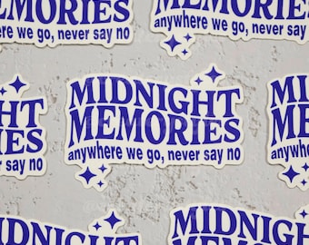 May include: Five stickers with the text "Midnight Memories" in blue lettering on a white background. The stickers have a sparkly design and the text "anywhere we go, never say no" is included on some of the stickers.