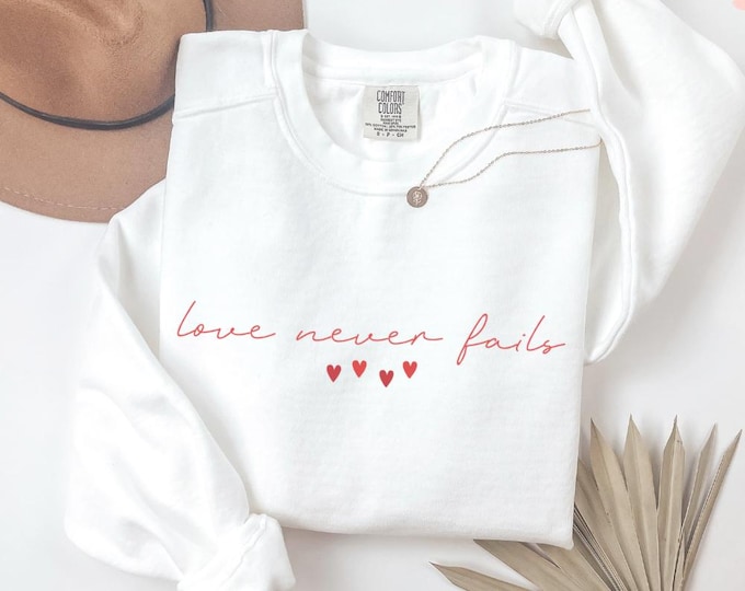 Comfort Colors Love Never Fails Valentines Day Sweatshirt - Valentine's Day Gift Couples Sweater, Romantic Anniversary Present