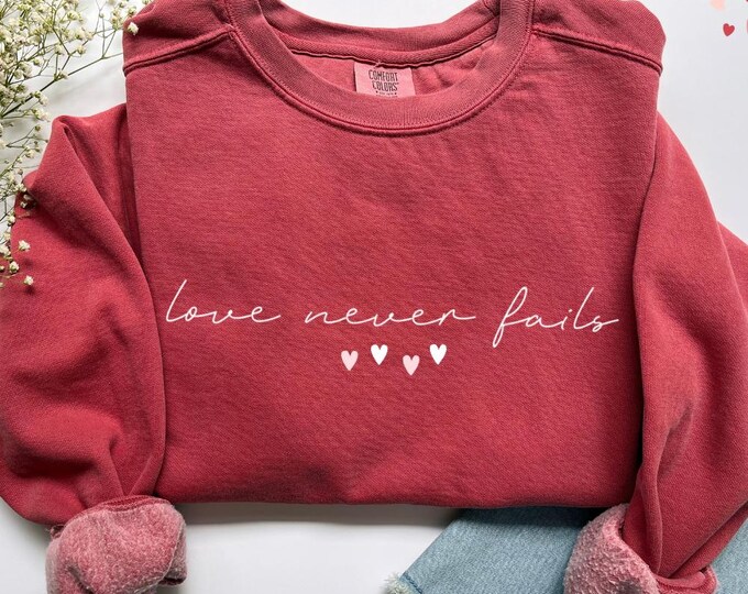Comfort Colors Love Never Fails Valentines Day Sweatshirt - Valentine's Day Gift Couples Sweater, Romantic Anniversary Present