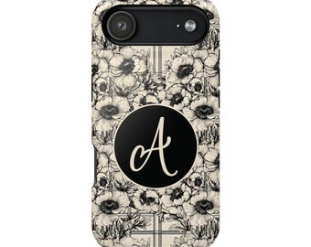 May include: A phone case featuring a floral pattern in black and white. The design includes a black circle with the letter "A" in white script. The case has a camera cutout and button placements.