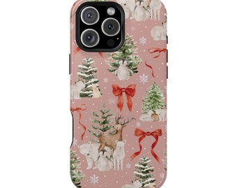 May include: A phone case with a festive winter design. The case features a repeating pattern of Christmas trees, deer, polar bears, penguins, red bows, and snowflakes on a pink background. The case has a black camera module.