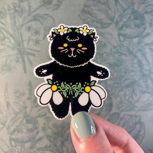 Black Cat Wearing Daisy Skirt Sticker | Vinyl, Waterproof & Laminated | Perfect for Water Bottles, Tumblers, Journals | Floral Cat Sticker
