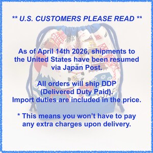 May include: A drawstring bag with a blue base and drawstring, featuring a white fabric with a Japanese-themed print. The text on the bag reads: "U.S. CUSTOMERS PLEASE READ" and other shipping information.