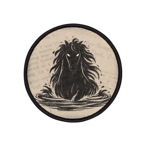 May include: Circular patch with a black illustration of a horse rising from water. The horse has glowing white eyes and a flowing mane. The patch has a black border and a beige background with faint text.