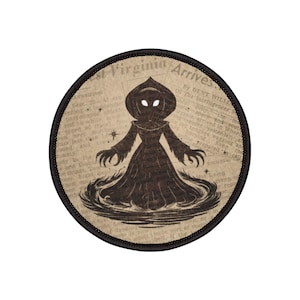 May include: A round patch featuring a dark silhouette of a cloaked figure with glowing eyes, set against a vintage newspaper background. The text "Virginia Arrives" is visible. The patch has a black border.