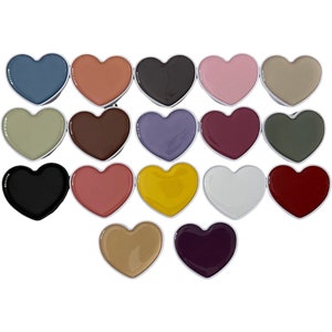 May include: A set of 18 heart-shaped phone grips in various colors, including black, white, red, yellow, green, blue, purple, brown, pink, and beige.