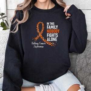 In This Family No One Fights Alone Sweatshirt, Cancer Support Shirt, Breast Cancer Awareness Gift, Family Cancer Shirt, Cancer Fight Shirt