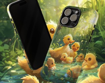 May include: A phone case with a colorful design featuring yellow ducklings swimming in a pond. The case has a black background and a clear plastic cover.