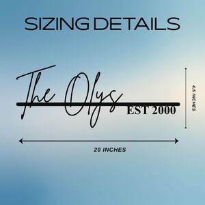 May include: A black metal wall sign featuring the text 'The Olys' in a cursive script above a horizontal line with 'EST 2000' below it. Dimension arrows indicate a height of 4.5 inches and a width of 20 inches, with the text 'SIZING DETAILS' above.