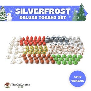 May include: A Silverfrost Deluxe Tokens Set featuring 247 miniature game pieces. The collection includes white circular tokens, red campfire shapes, grey triangular markers, square grey blocks, white log cylinders, brown acorn-like pieces, and green foliage clusters.