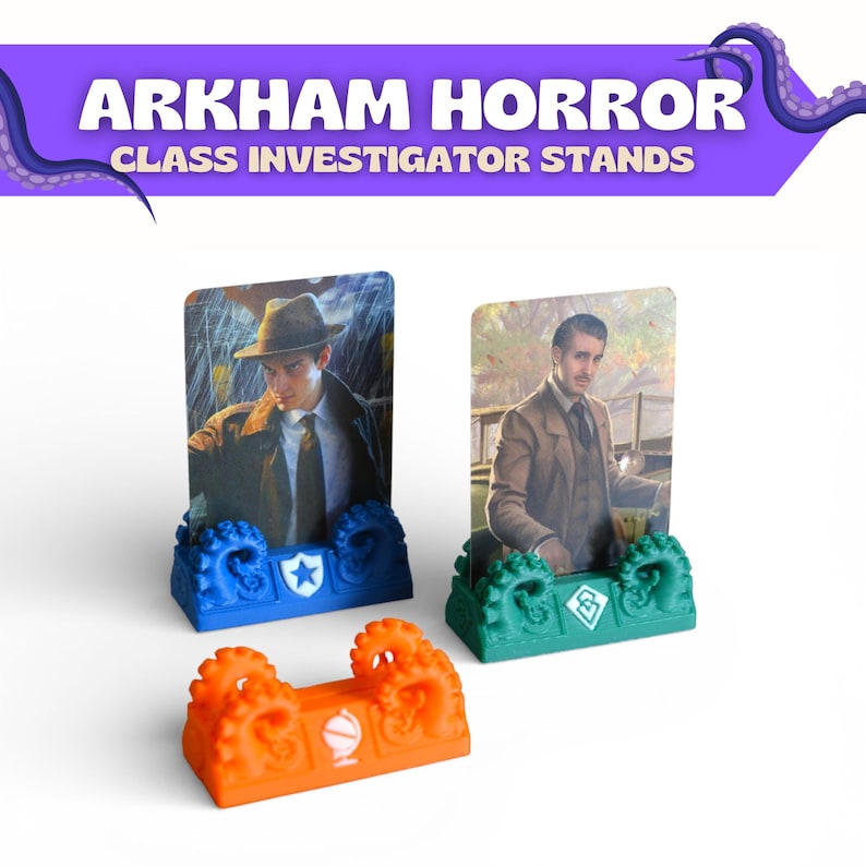 May include: Three rectangular plastic investigator stands for Arkham Horror, featuring sculpted tentacle designs on the sides. One blue stand holds a character card, one green stand holds a character card, and one orange stand is empty. Each stand displays a white icon.