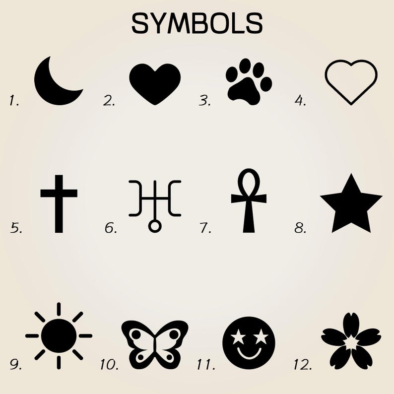May include: Image featuring a collection of black symbols on a light background. The symbols include a crescent moon, heart, paw print, outline heart, cross, stylized design, ankh, star, sun, butterfly, smiley face, and flower.