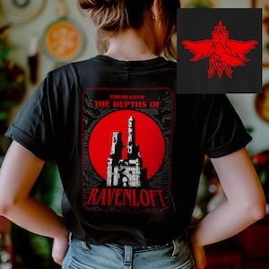 May include: Black t-shirt with a graphic print of a castle and the text "Forever lost in the depths of Ravenloft".