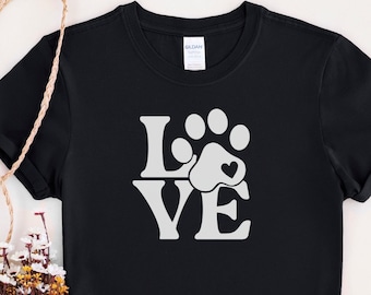 May include: Black t-shirt with a white graphic of a paw print with a heart inside and the word "LOVE" written vertically.