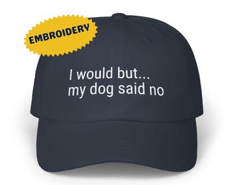 May include: Navy blue baseball cap with white embroidery that reads "I would but... my dog said no".