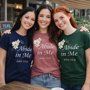 Christian women wearing abide in me shirts group lifestyle faith apparel aesthetic outfits