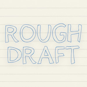May include: Blue handwritten text on lined paper reads "ROUGH DRAFT". The words are in a simple, outlined font, suggesting a casual or preliminary note. The background is a cream-coloured paper with horizontal lines.
