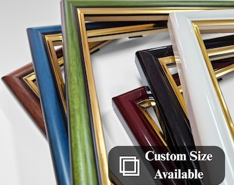 May include: A close-up of five different picture frames with gold trim. The frames are stacked on top of each other, with the green frame on top. The frames are made of wood and have a variety of colors, including green, blue, brown, black, and white. The text "Custom Size Available" is visible in the lower right corner of the image. The text "Arta Atelier" is visible in the lower right corner of the image.