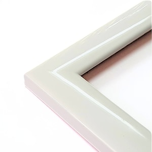 Glossy White Frame,Crafted from High-Quality Wood,Perfect for Displaying Photos Posters and Custom Artwork.Elevate Your Home or Office Decor