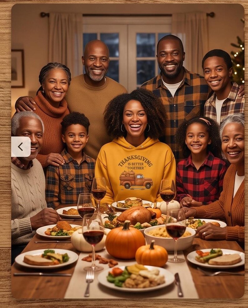 A large family gathers around a festive dinner table for Thanksgiving while a woman in the center wears a yellow hoodie with a truck graphic.