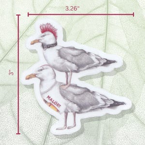 May include: Two quirky seagull stickers. One seagull has a red mohawk and a studded collar. The other seagull has a banner that says "MALÖRT". Each sticker is approximately 7.6 cm tall and 8.3 cm wide.