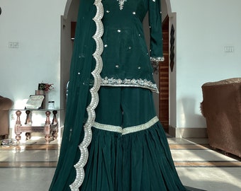 Beautiful stylish green fancy dress made with pure raw silk hannd embroidery on it for wedding season and eid collection