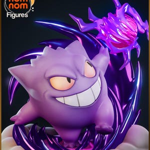 May include: A purple Gengar figure with a wide grin and yellow eyes, surrounded by dark purple energy effects. The figure is set against a dark background, with the "nom nom Figures" logo in the top left corner.