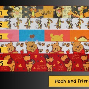 May include: A collection of colorful ribbons featuring characters from Winnie the Pooh. Designs include Tigger, Pooh Bear, and bees. The ribbons have a variety of backgrounds, including red, white, and orange. The text "Pooh and Friends" is displayed on a yellow background.