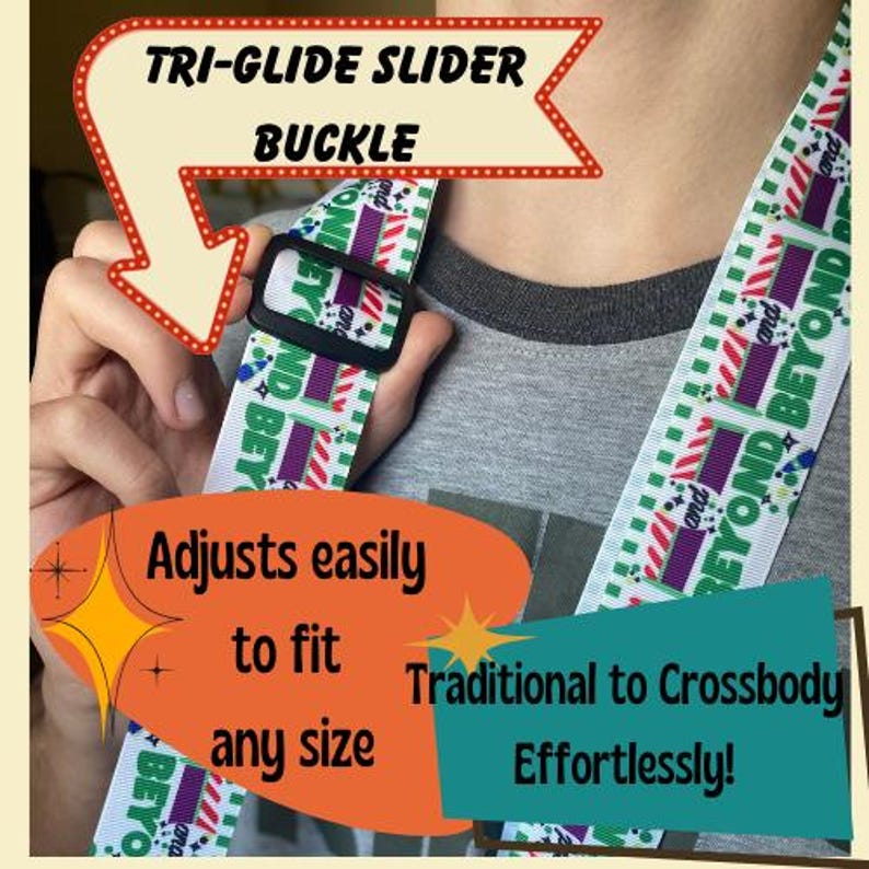 May include: A black tri-glide slider buckle on a white strap with the text "Beyond" and colorful geometric patterns. The strap is designed to adjust easily to fit any size, from traditional to crossbody.