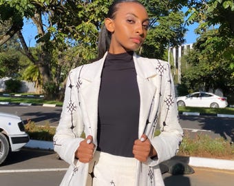 Ethiopian Elegance: Handwoven Habesha Coat & Skirts with Black Cross Embroidery