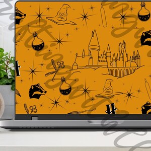 May include: A laptop computer with a yellow background and black illustrations of a castle, stars, potions, and a badger. The text "H" is also visible on the background.
