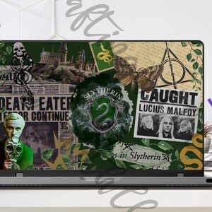 May include: A laptop computer with a green, black, and gold Harry Potter themed design. The design includes the words "Death Eater", "Slytherin", and "Caught Lucius Malfoy".