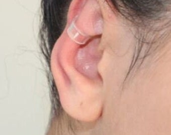 Transparent ear corrector