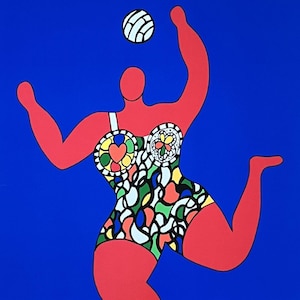 May include: A vibrant pop art print featuring a red figure playing volleyball against a blue background. The figure wears a colorful swimsuit with heart and floral designs. A white and black volleyball is in the air.