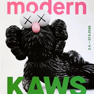May include: Poster featuring a black KAWS figure with white eyes and a pink nose. The poster has the text "ALBERTINA modern" in pink and "KAWS ART & COMIX" in green. Dates are listed in green.
