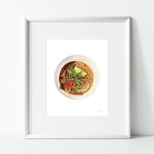 Puede incluir: Una ilustraci&oacute;n de acuarela de un taz&oacute;n de pho vietnamita, una sopa de fideos tradicional. El taz&oacute;n est&aacute; lleno de caldo, fideos, carne y verduras, incluyendo cebollas verdes, cilantro y una rodaja de lima.