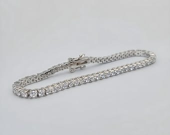 White Moissanite Tennis Bracelet - 3mm Round Cut D-VVS1 - 4.5CTW - 925 Sterling Silver - 7" Length
