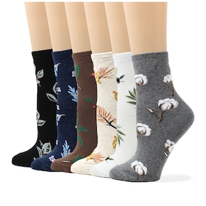 May include: Six pairs of colorful ankle socks with different floral patterns. The socks are made of cotton and are designed for comfort and style.