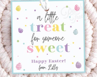 May include: A light blue Easter gift tag with colorful Easter eggs and the text "a little treat for someone sweet! Happy Easter! from: Lilly"