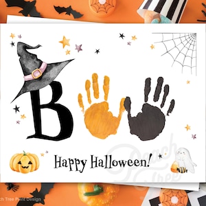 May include: A white card with a black witch hat, the letter "B", two handprints, one orange and one black, and the text "Happy Halloween!"